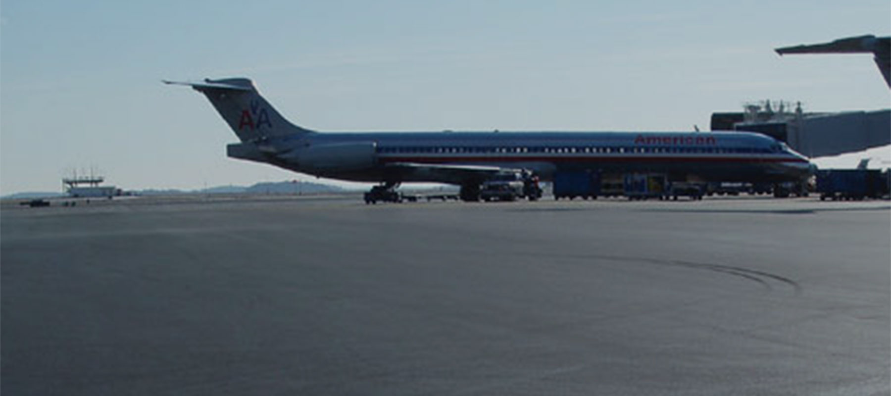 A large American Airlines plane on the tarmac at Logan Airport.