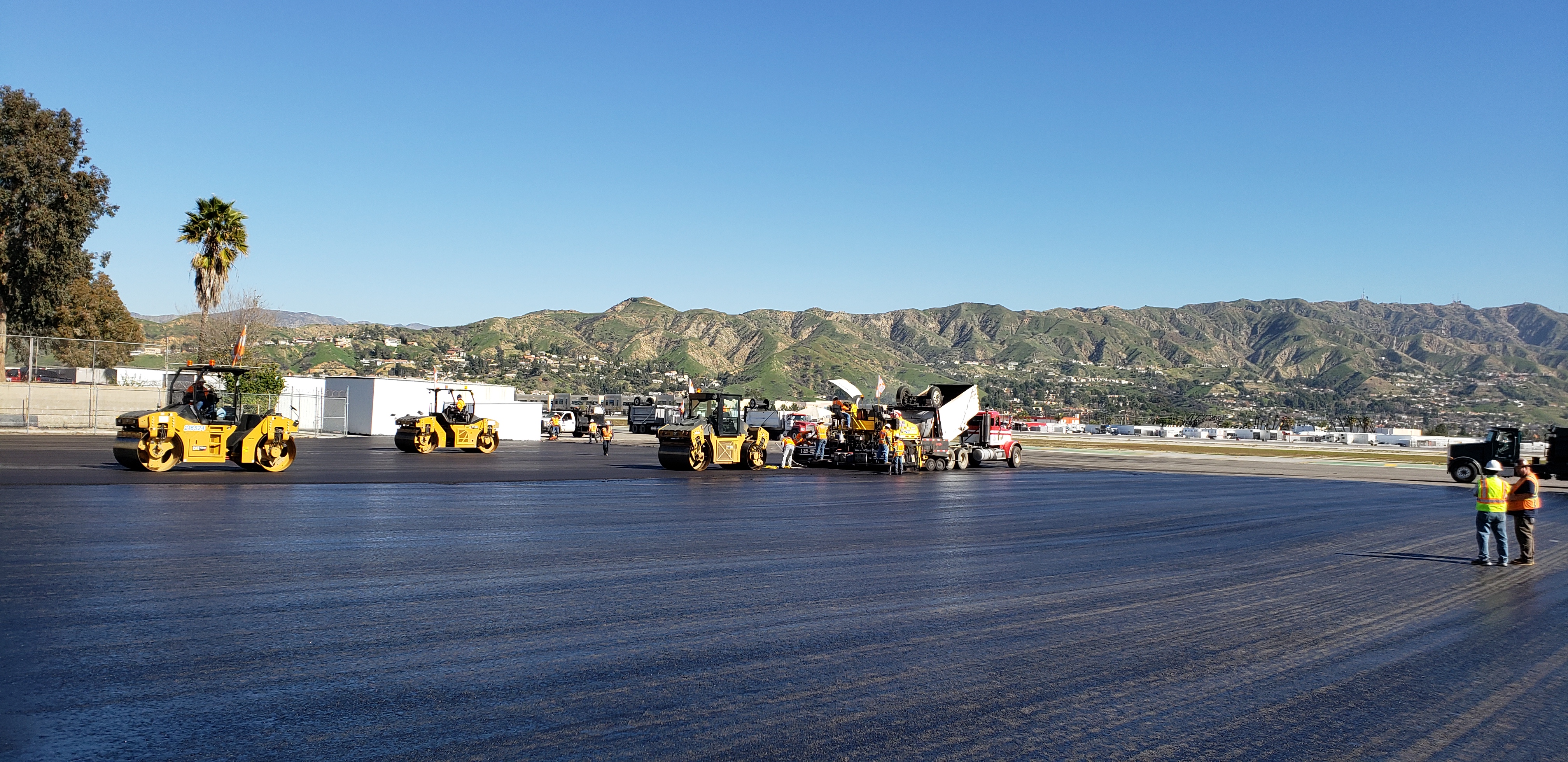 A group of asphalt rollers at Hollywood-Burbank Airport applying StellarFlex FR.